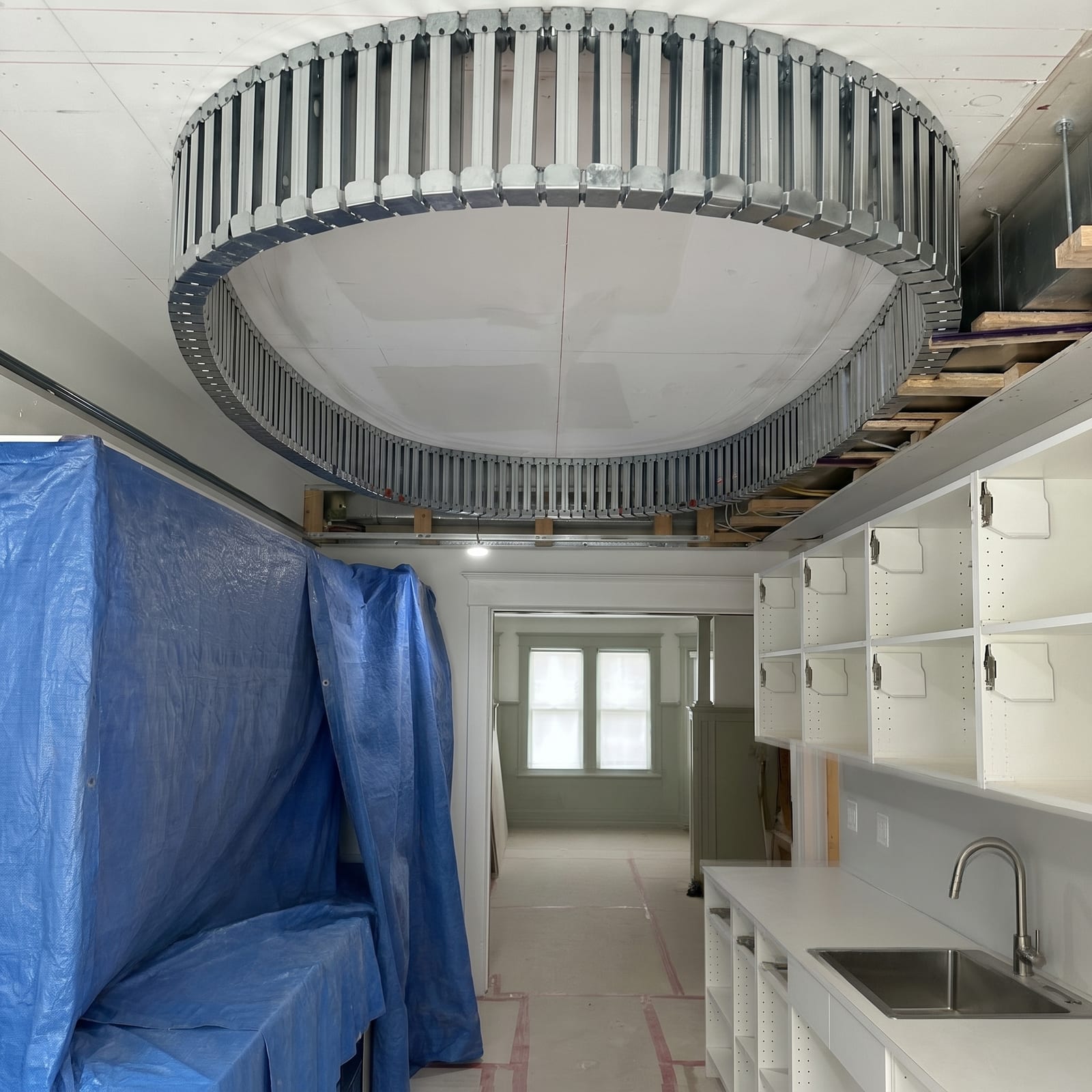 Custom circular dome ceiling with steel framing system in Toronto luxury home construction by J&R
